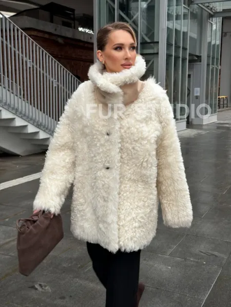 Белая шубка из тиградо - фото 16