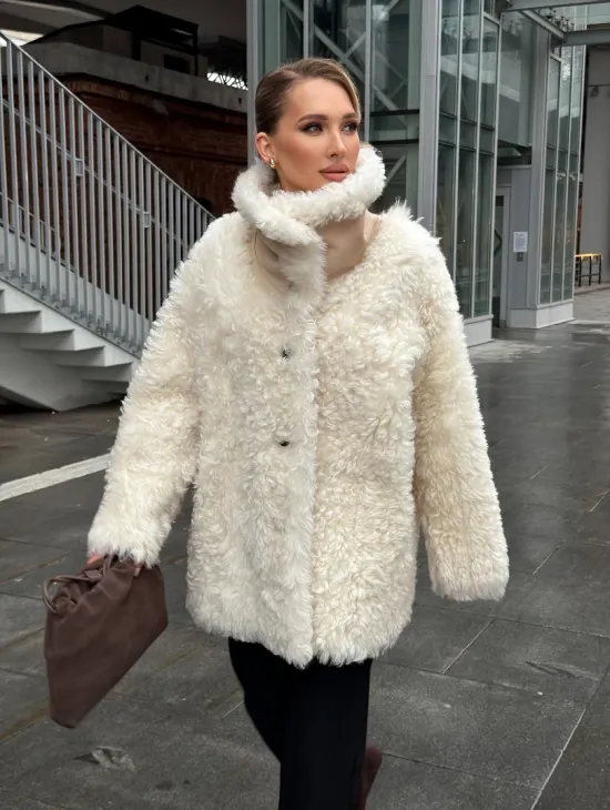 Белая шубка из тиградо - фото 16